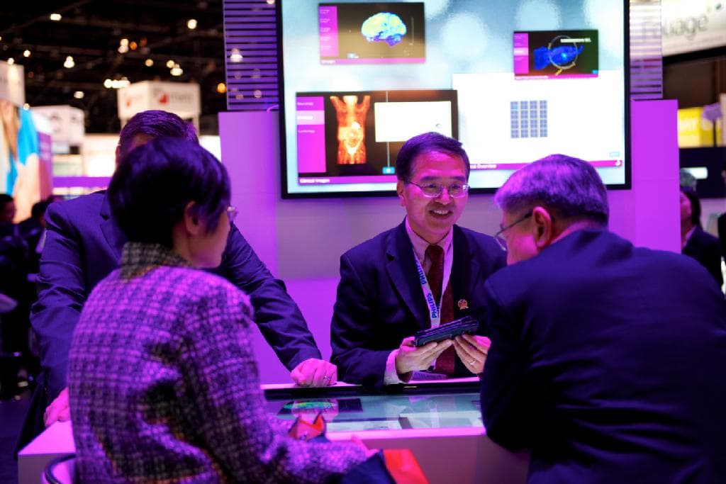 A multi-user interactive touchscreen installation engaging visitors in a corporate environment.